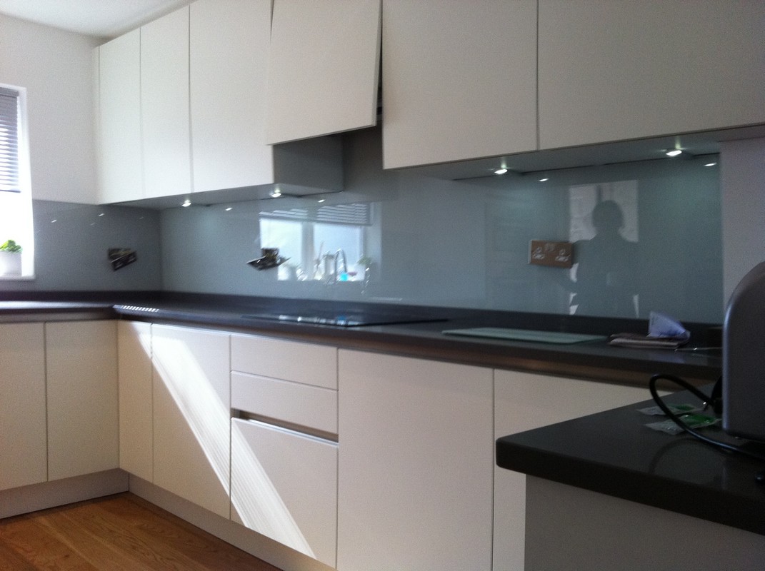 Grey glass kitchen splashback with LED lighting in Newport Pagnell